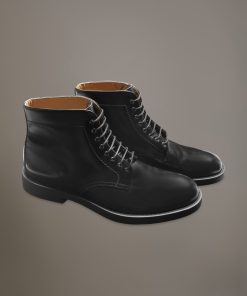 100% brushed leather boots with rubber sole